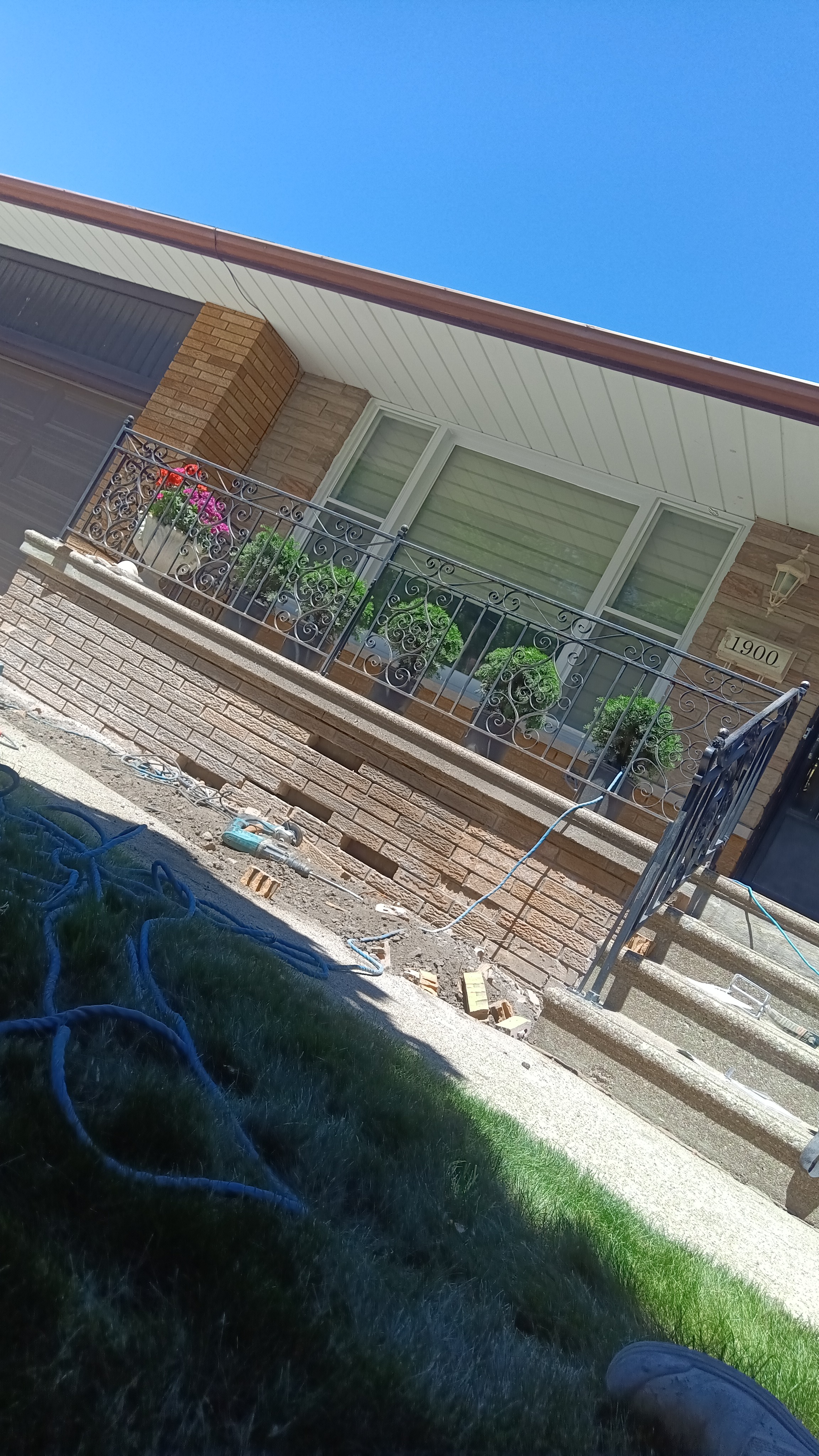 Front porch steps under construction before repair
